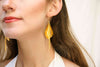 Shining gold-plated dangling earrings, like flowers,exuding elegance and sophistication